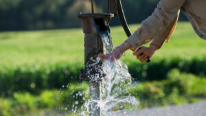 water being pumped out of a well