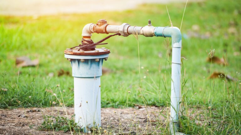 water being pumped out of a well